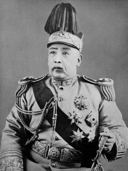 1916 – Yuan Shikai Abdicates as Emperor of China